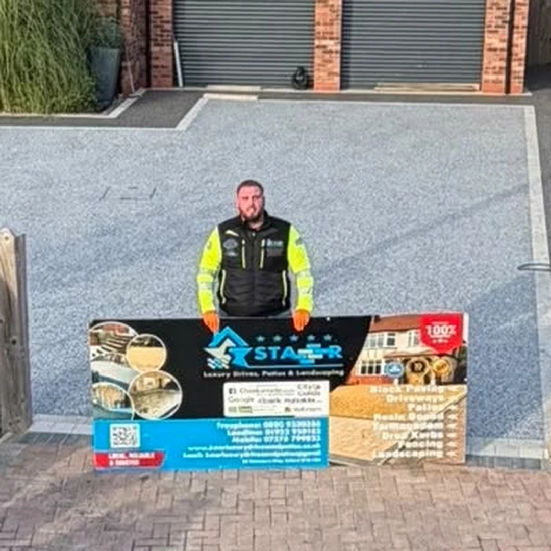 Harry Smith, owner of 5 Star Luxury Drives, Patios & Landscaping, on a finished resin driveway